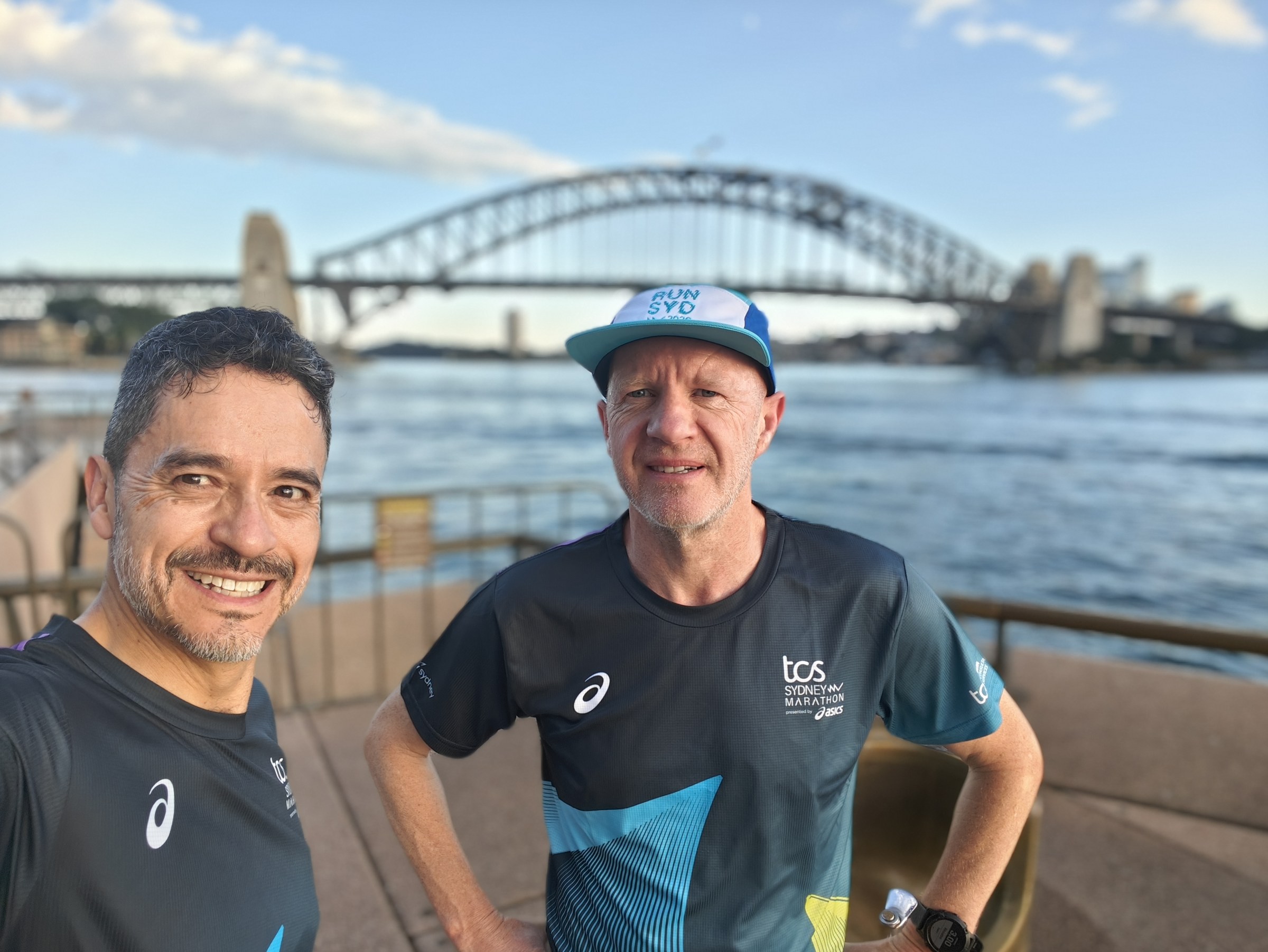 Two recreational runners beside Sydney Harbour